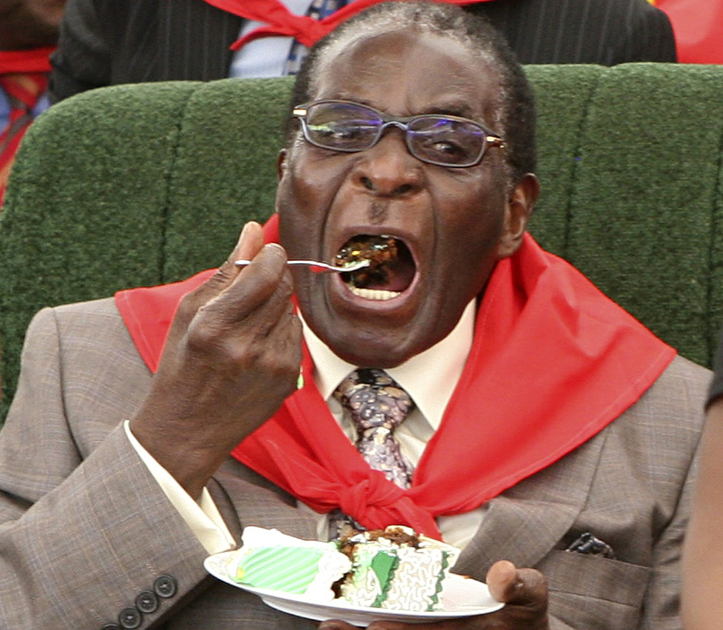 Robert Mugabe eating cake