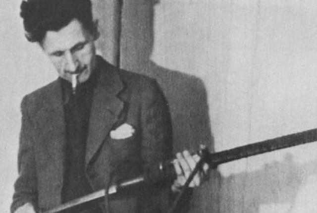 George Orwell with rifle