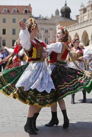 Indigenous European girls in local national dress.